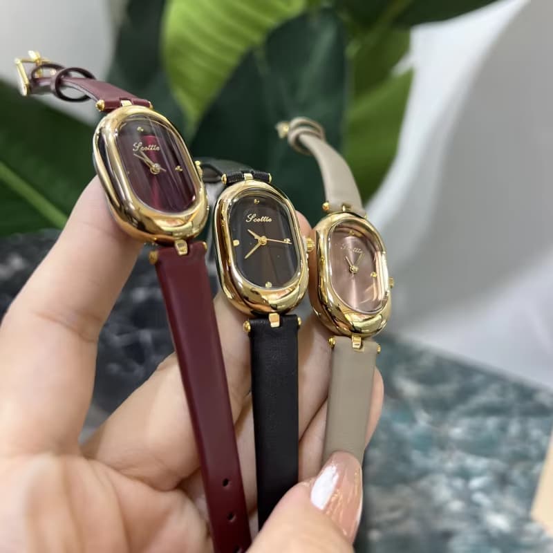 Classic Women's Watches Retro Burgundy Elliptical Dial Premium Leather Strap Elegant Quartz Wristwatch - Gadget Rush BD